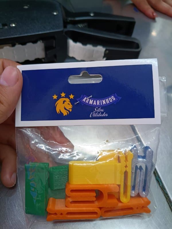 Prendedor de Embalagens (CORES SORTIDAS) C/10